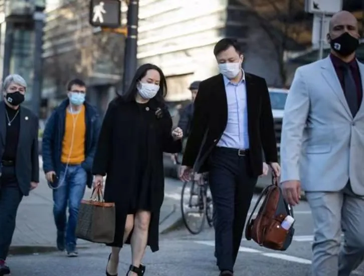 孟晚舟回国24小时后，她背后的男人火了